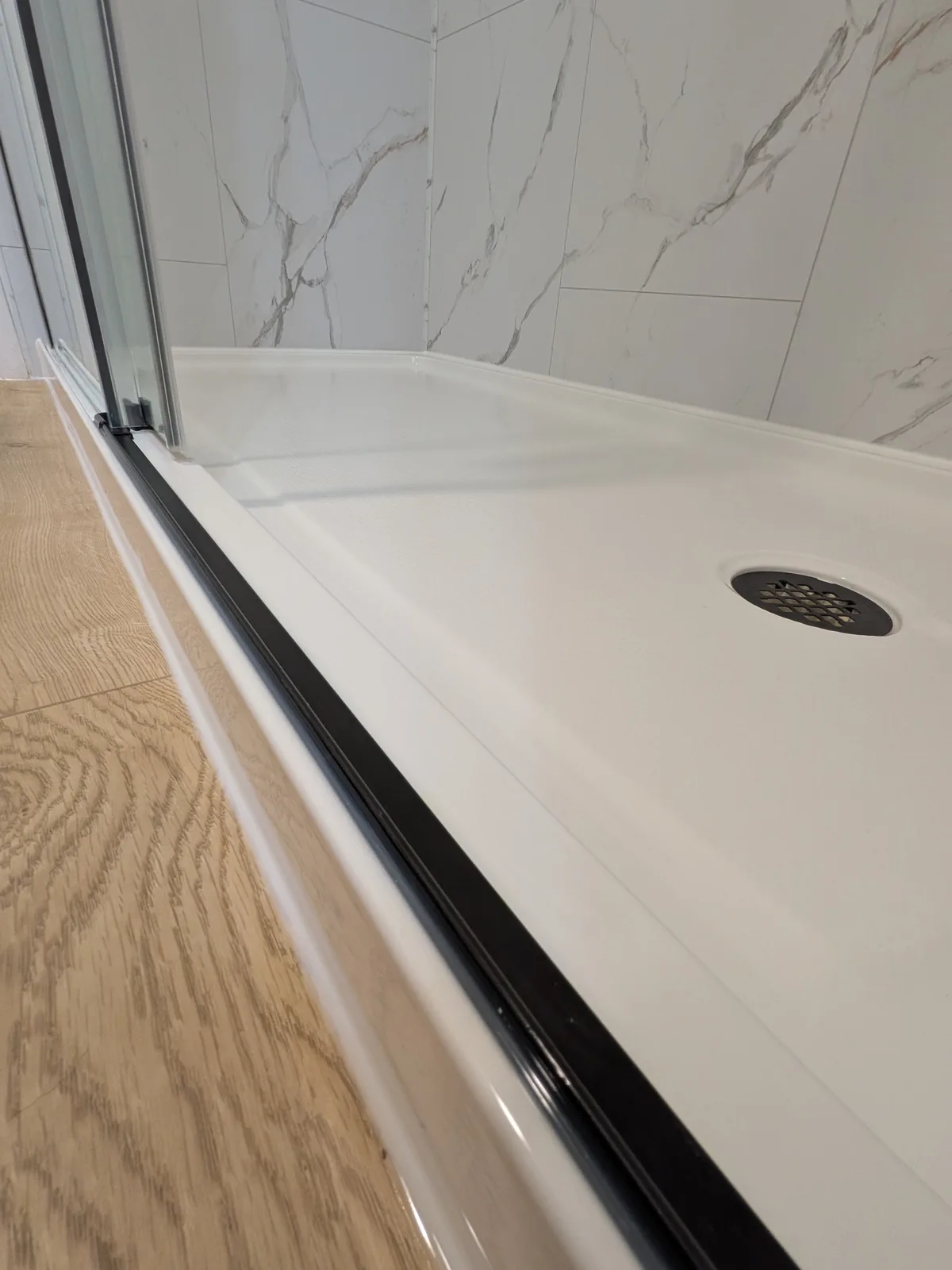 Toilet and window wall in the remodeled bathroom