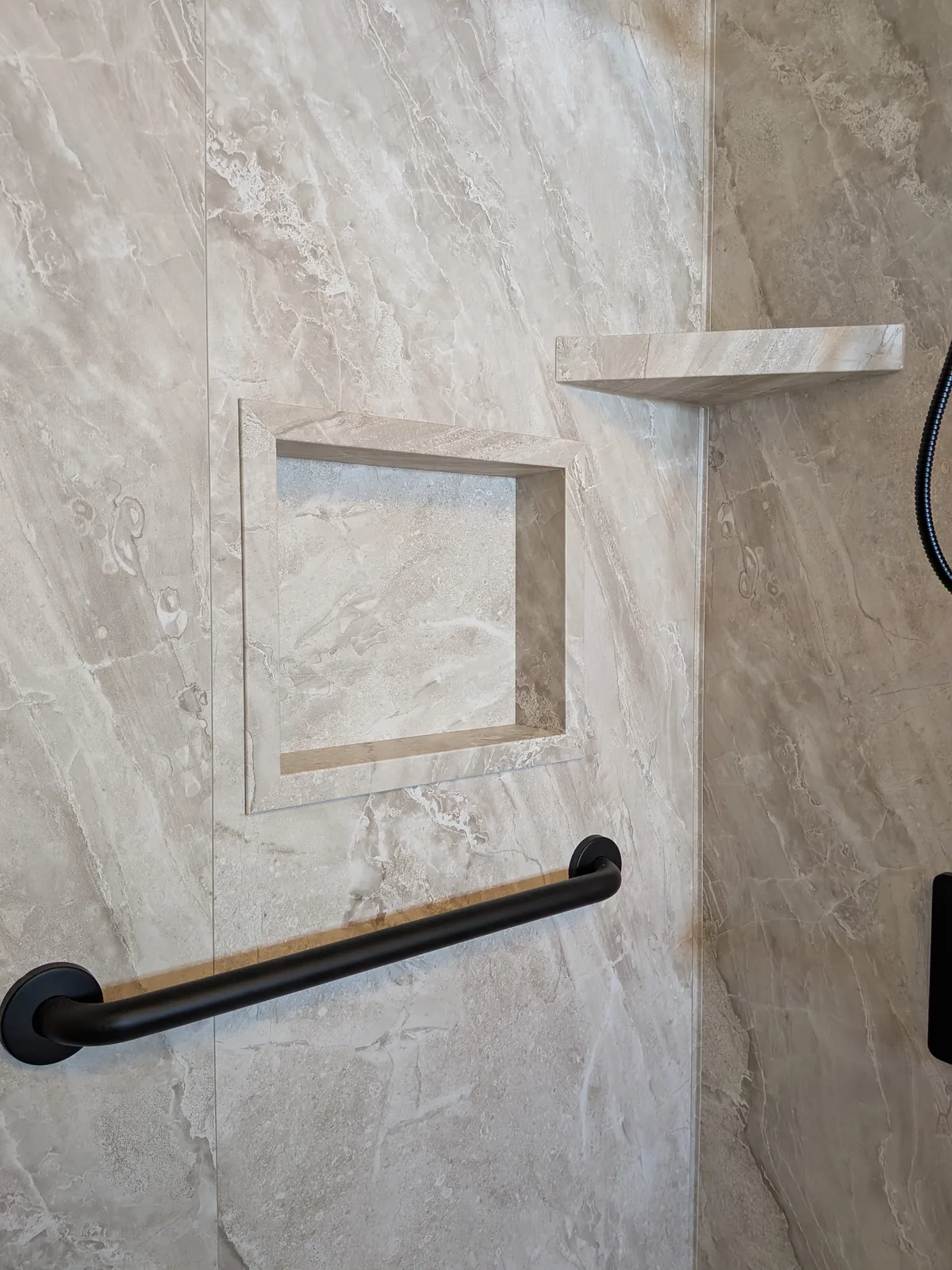 Walk-in shower and new flooring after the remodel